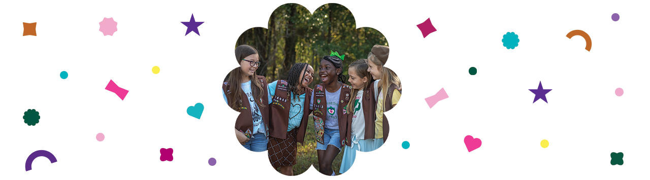  group of brownie Girl Scouts hugging and smiling 